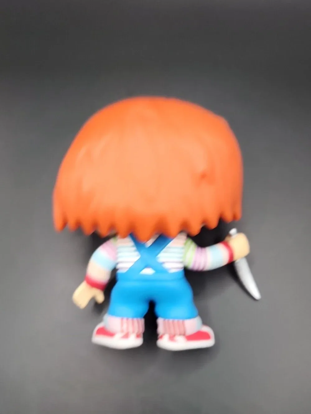Funko Chucky Vinyl Figure with Orange Hair and Blue Overalls